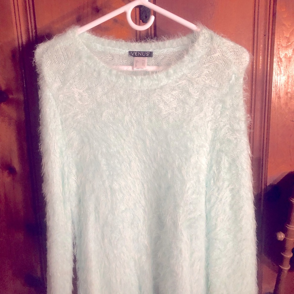 Beautiful warm soft sweater. It says small but runs bigger